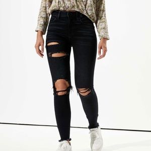 Jet black mid-high rise distressed AE jeggings